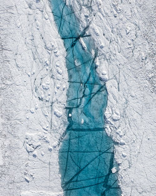 Тающая Гренландия в аэрофотоснимках Тома Хегена как напоминание о проблеме глобального потепления (19 фото)