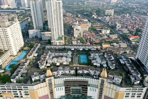 Деревни на крышах Джакарты (10 фото)
