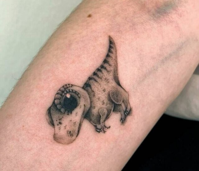 Крутые татуировки для любителей динозавров (23 фото)