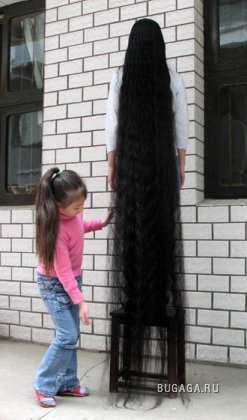 Девушка с волосами длиной 2 м 42 см